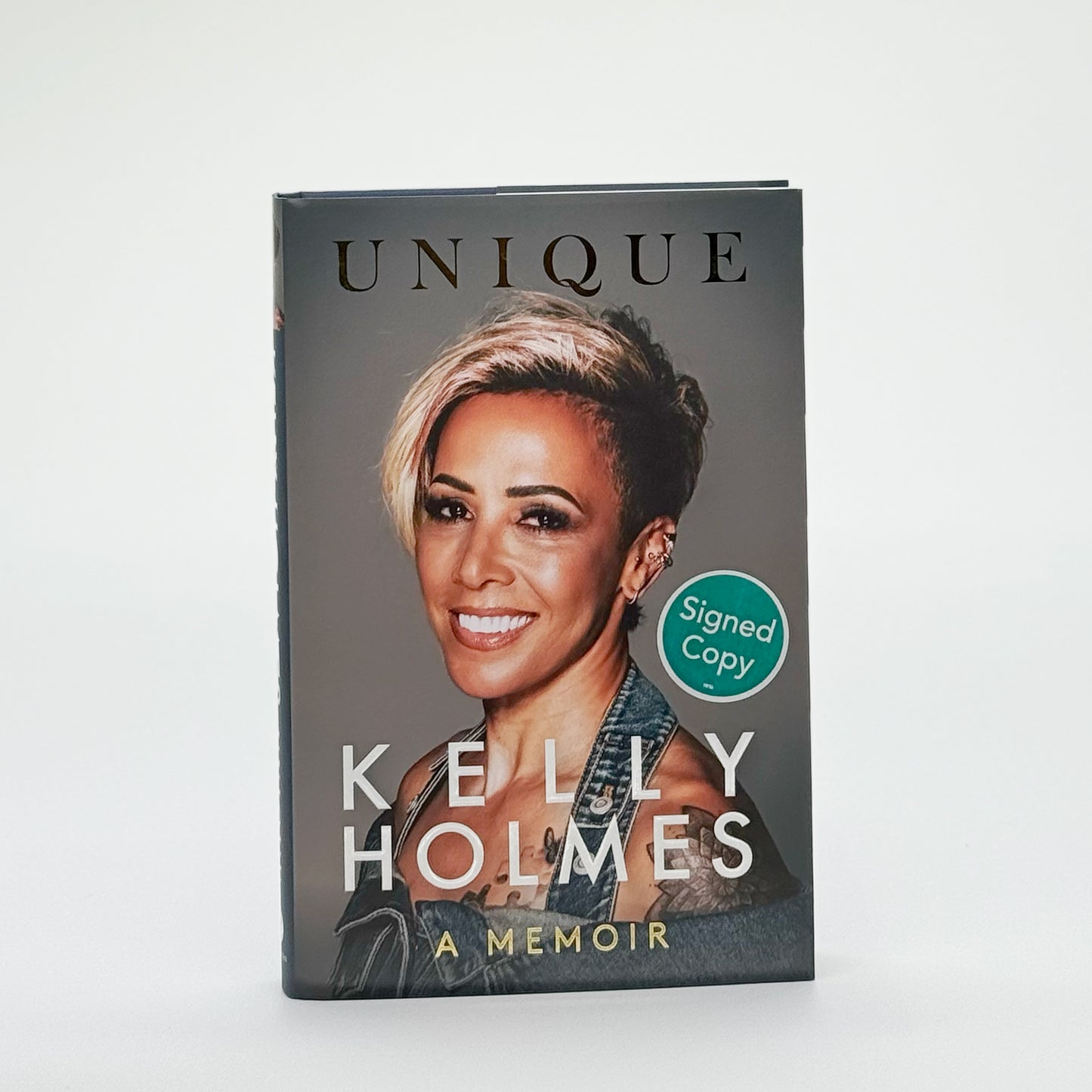 Holmes, Kelly - Unique (Signed)